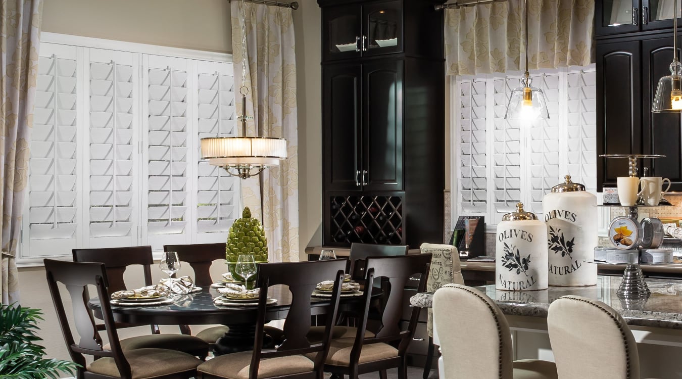 Plantation shutters in an open kitchen.